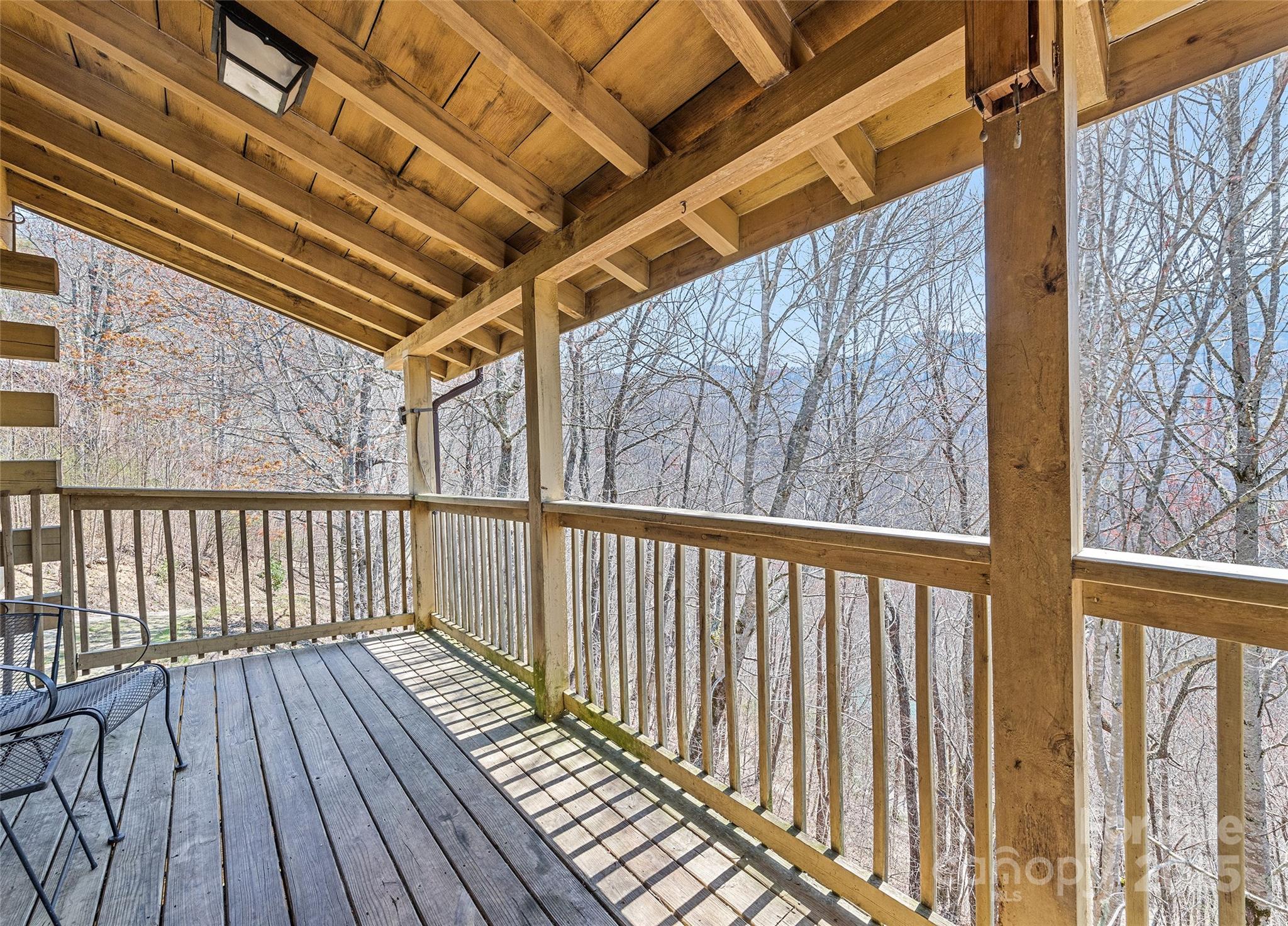 173 Blizzard Ridge Maggie Valley, NC 28751 - Photo 5 of 37 a view of wooden balcony