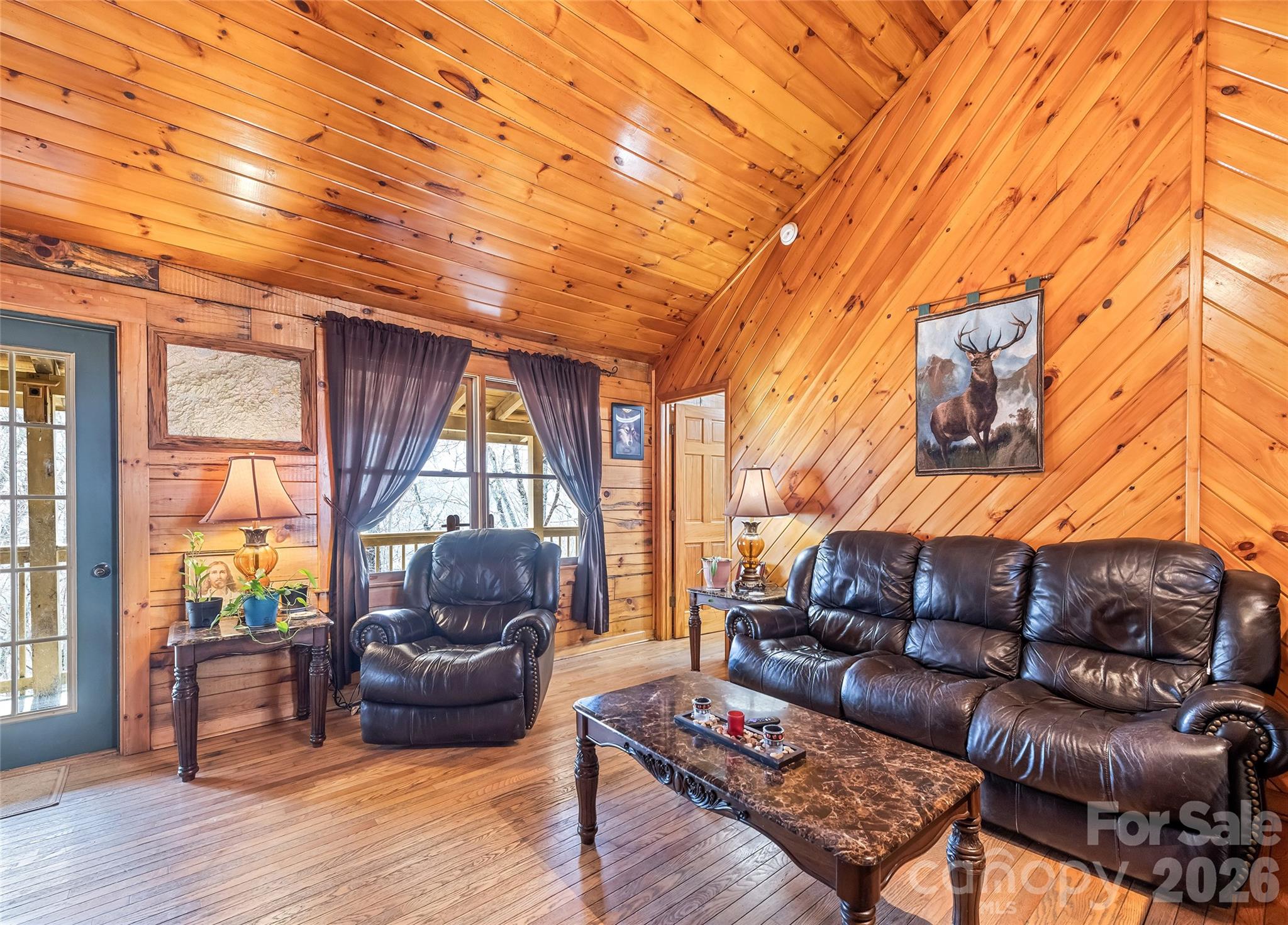 173 Blizzard Ridge Maggie Valley, NC 28751 - Photo 6 of 37 a living room with furniture and a window