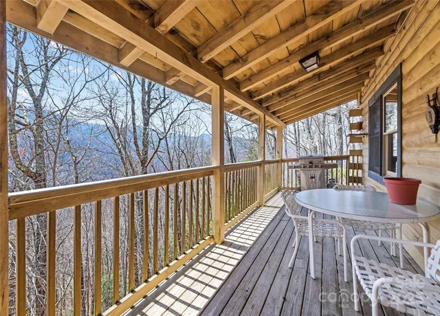 a balcony with wooden floor
