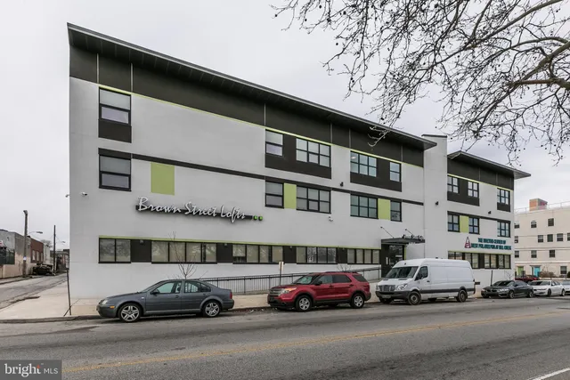 a car parked in front of a building