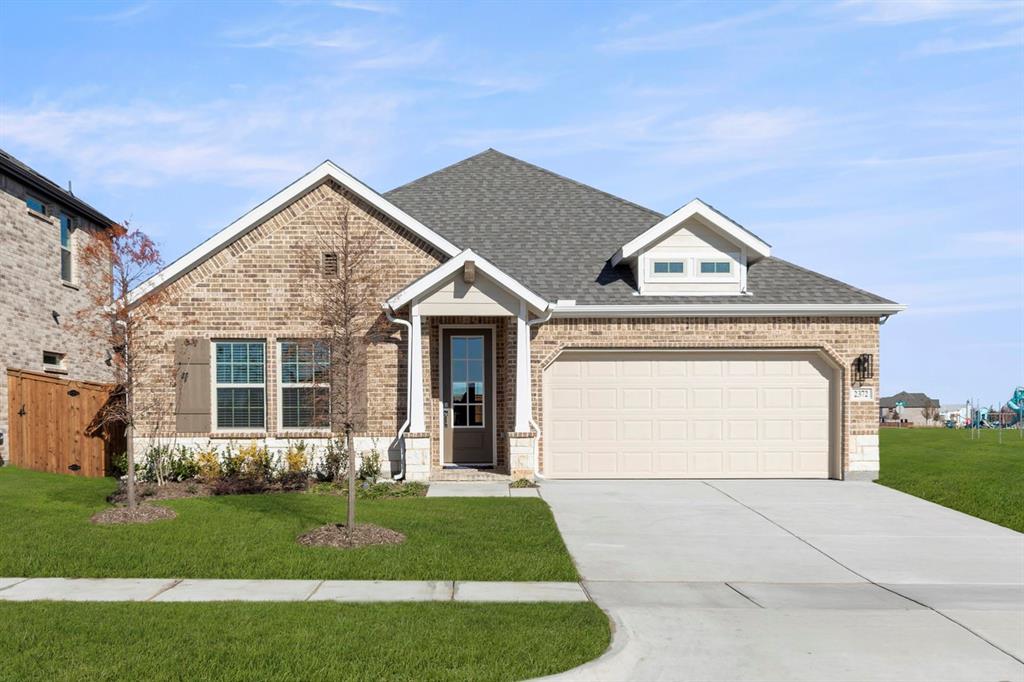 2372 Bell Way Forney, TX 75126 - Photo 1 of 39 a front view of a house with a yard and garage