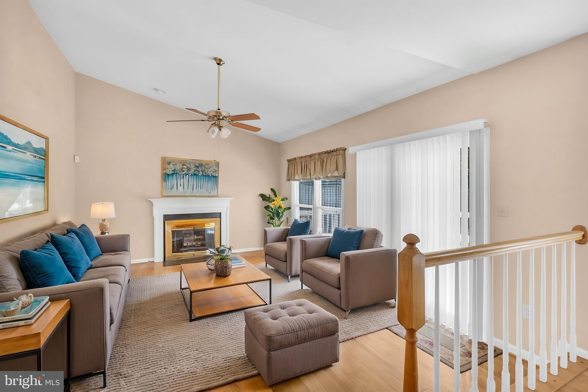 13988 Dancing Twig Drive Gainesville, VA 20155 - Photo 22 of 62 a living room with furniture and a window