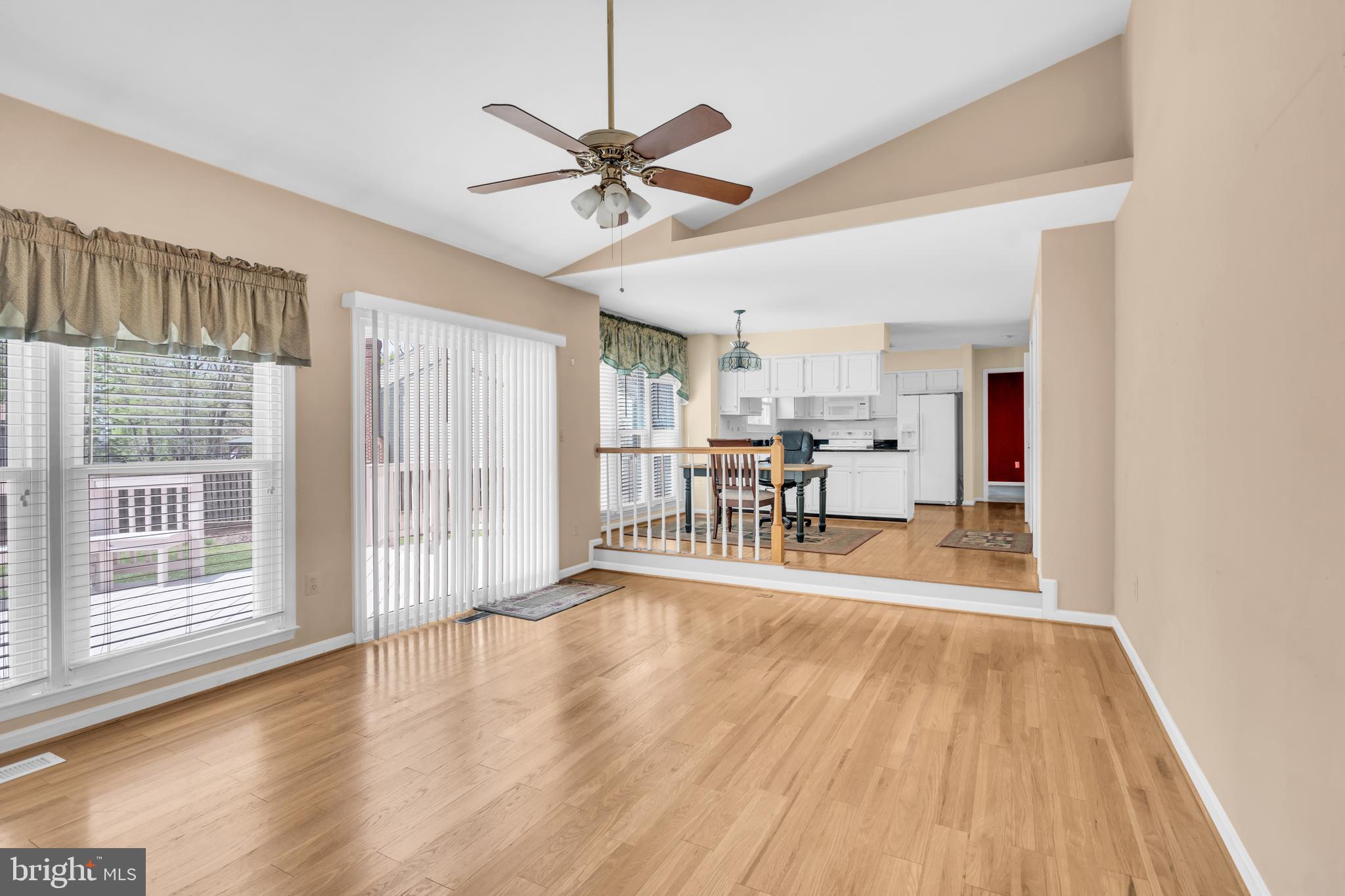 13988 Dancing Twig Drive Gainesville, VA 20155 - Photo 23 of 62 a view of a livingroom with wooden floor