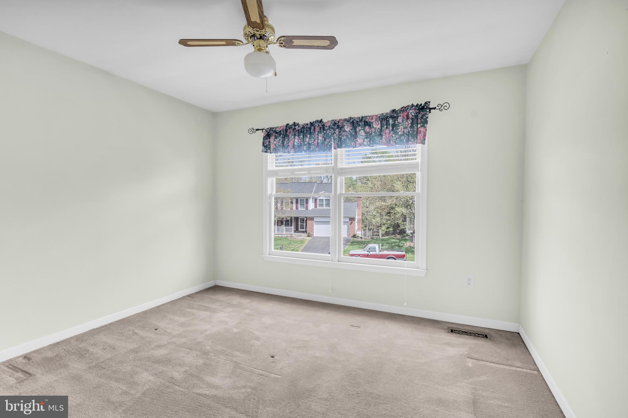13988 Dancing Twig Drive Gainesville, VA 20155 - Photo 36 of 62 a view of an empty room with a window