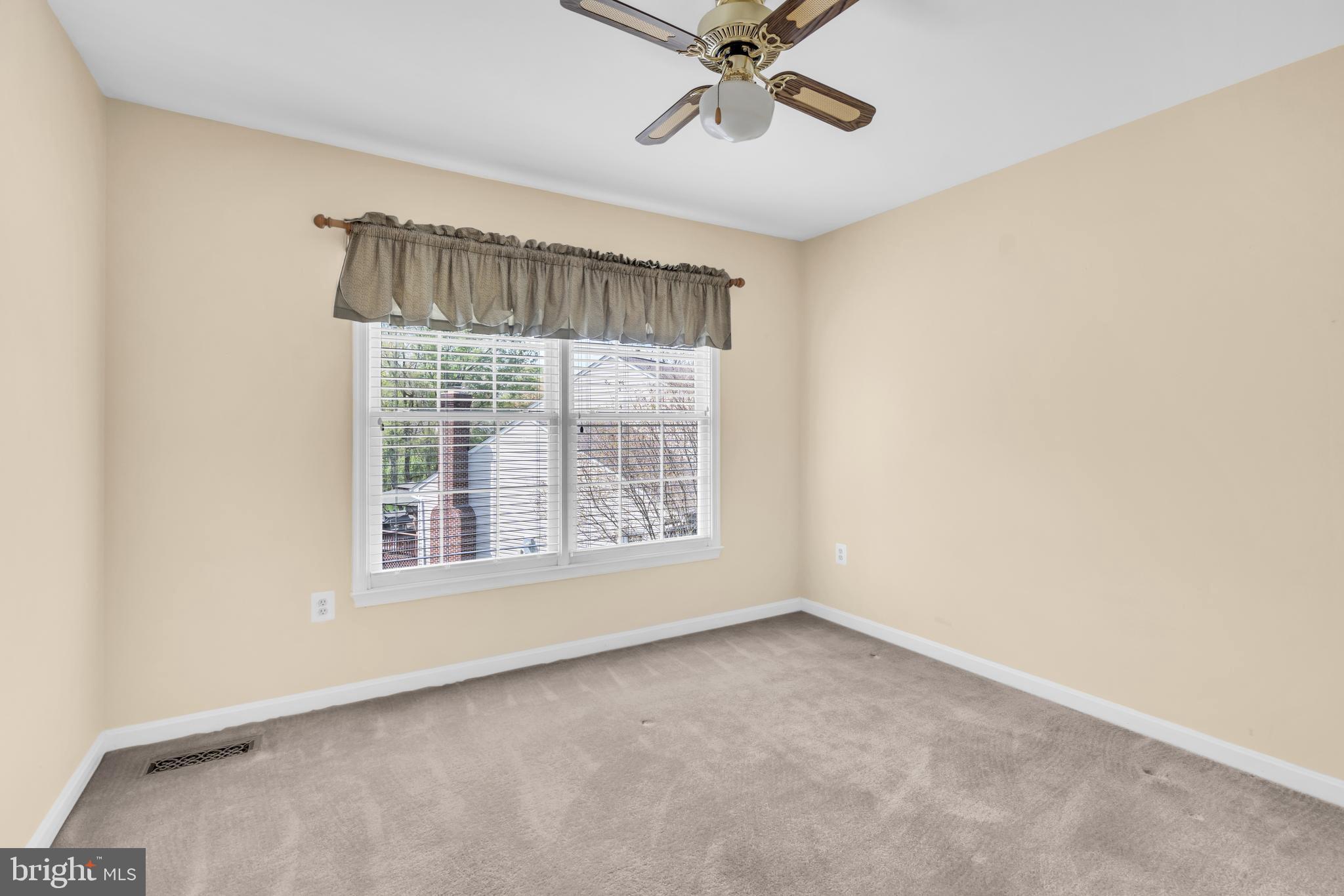 13988 Dancing Twig Drive Gainesville, VA 20155 - Photo 40 of 62 a view of an empty room with a window
