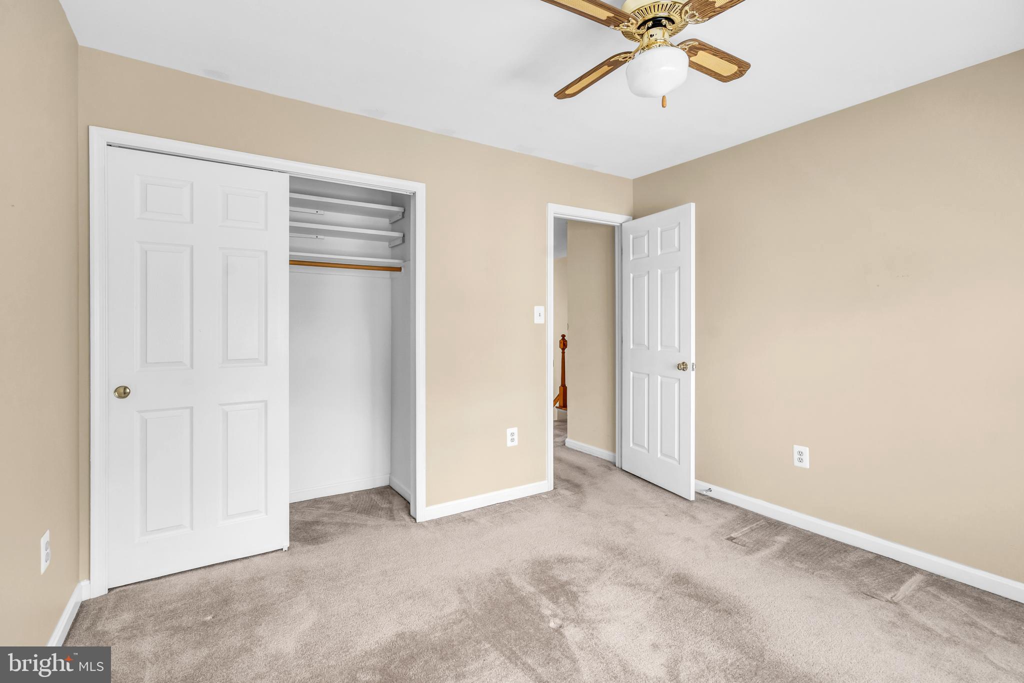 13988 Dancing Twig Drive Gainesville, VA 20155 - Photo 42 of 62 an empty room with a ceiling fan