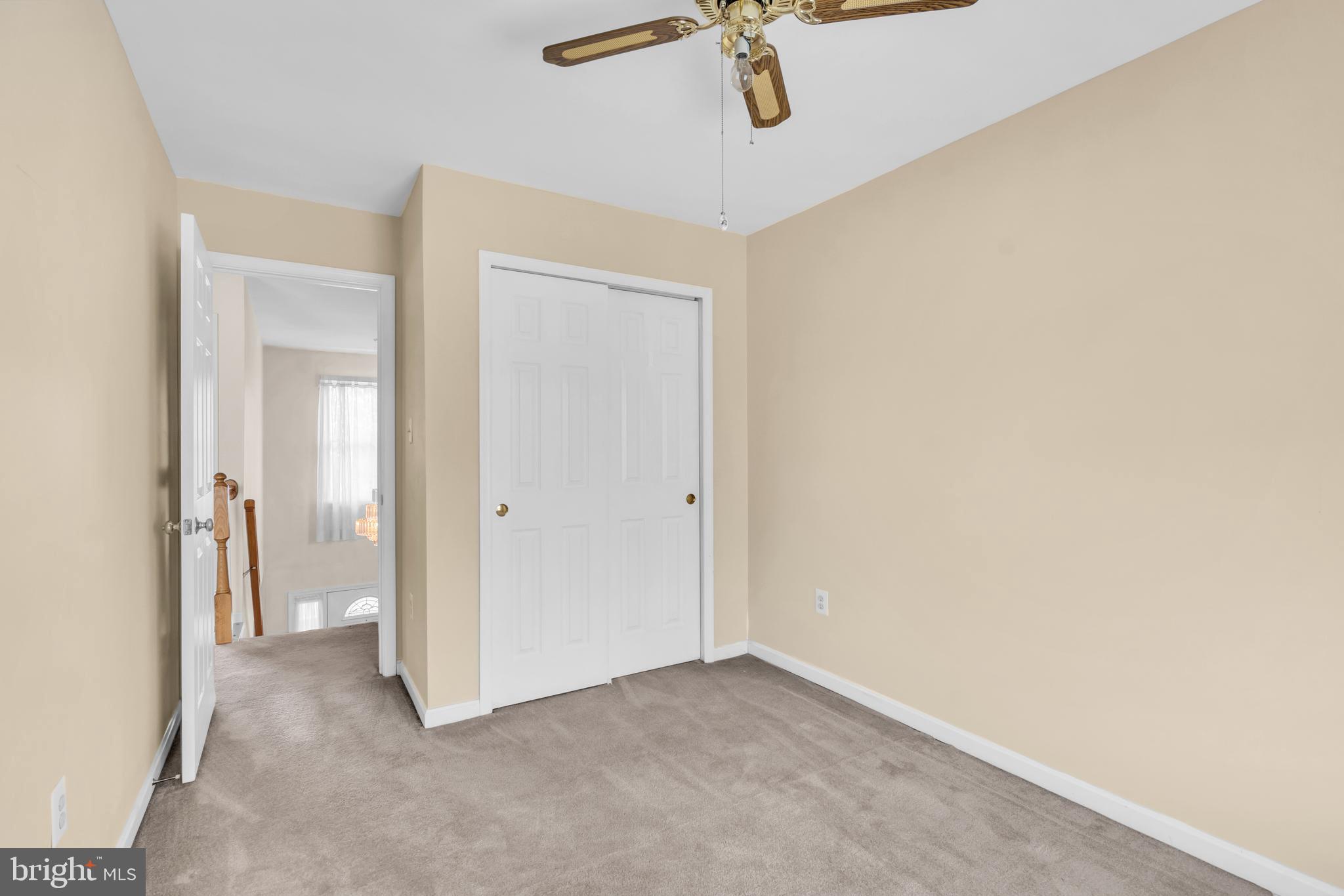 13988 Dancing Twig Drive Gainesville, VA 20155 - Photo 44 of 62 a view of a hallway with a chandelier fan