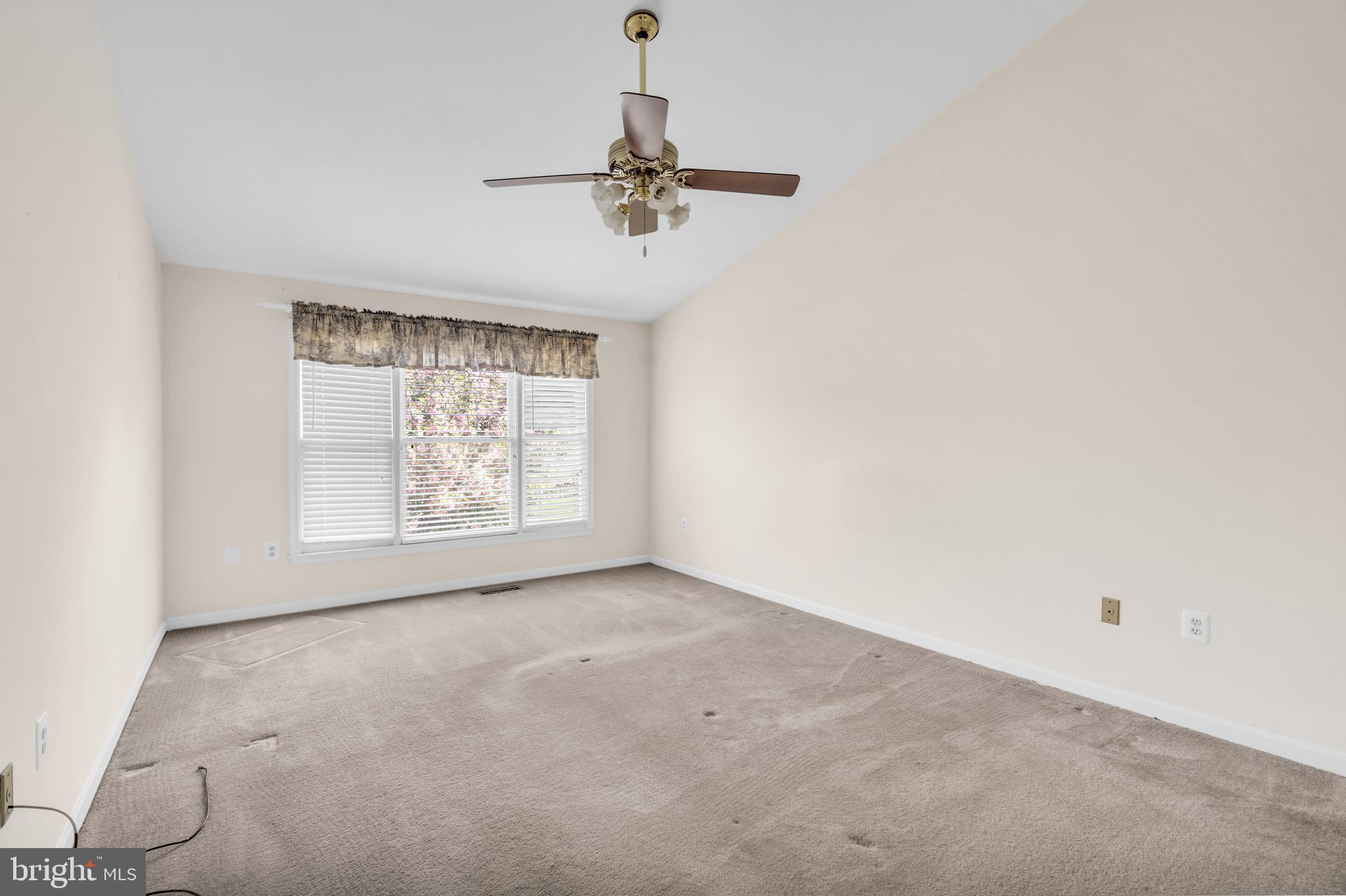 13988 Dancing Twig Drive Gainesville, VA 20155 - Photo 45 of 62 an empty room with windows and fan