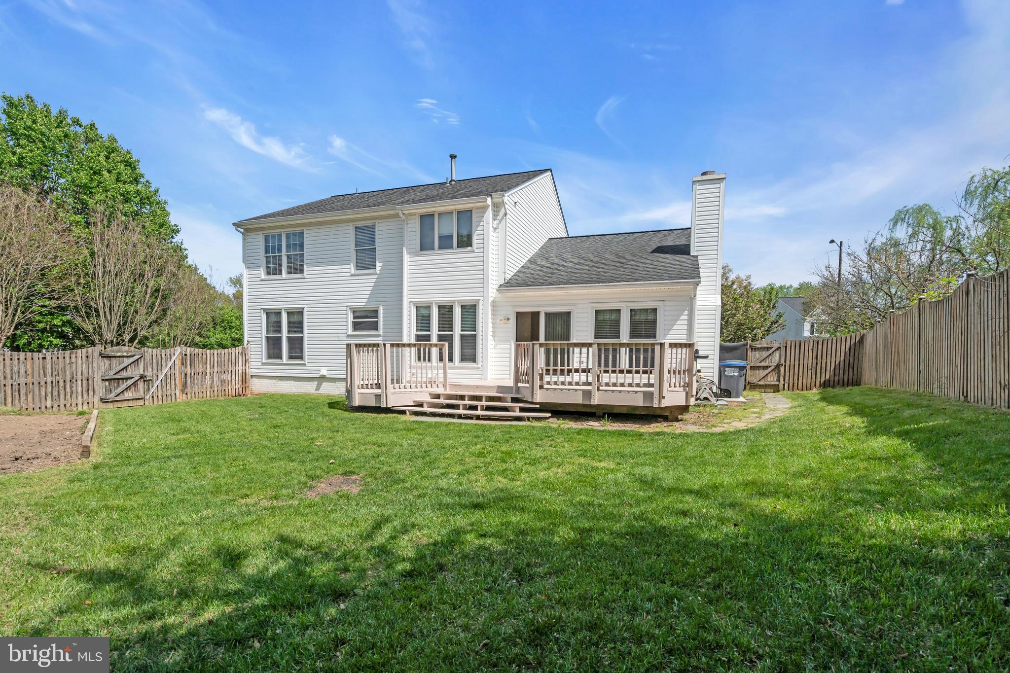 13988 Dancing Twig Drive Gainesville, VA 20155 - Photo 5 of 62 a view of house with a backyard