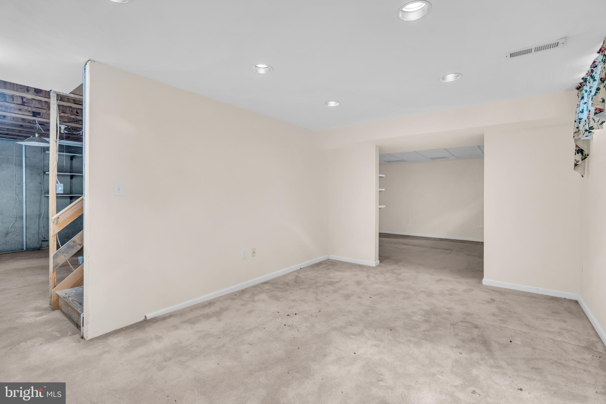 13988 Dancing Twig Drive Gainesville, VA 20155 - Photo 55 of 62 a view of an empty room with stairs