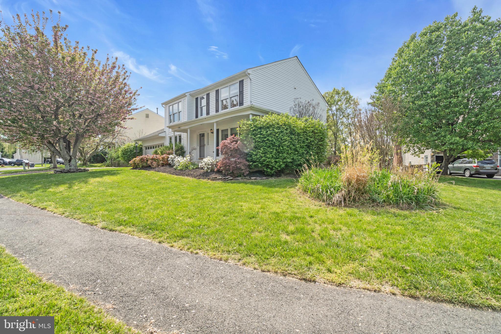 13988 Dancing Twig Drive Gainesville, VA 20155 - Photo 56 of 62 a view of a house with garden and trees