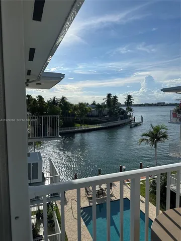 a view of a lake from a balcony