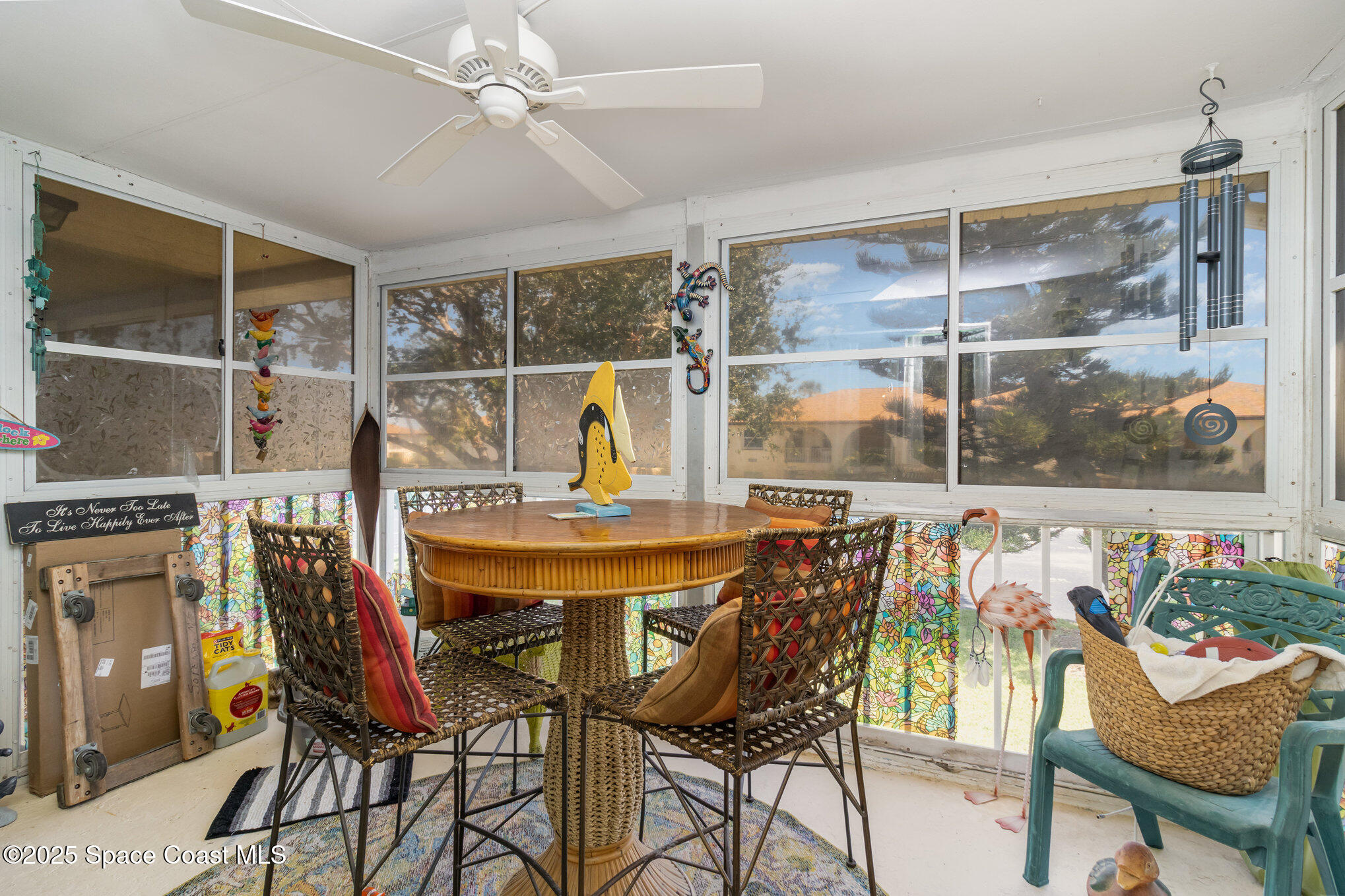 415 School Road, Unit 70 Indian Harbour Beach, FL 32937 - Photo 14 of 16 a view of a dining room with furniture window and outside view