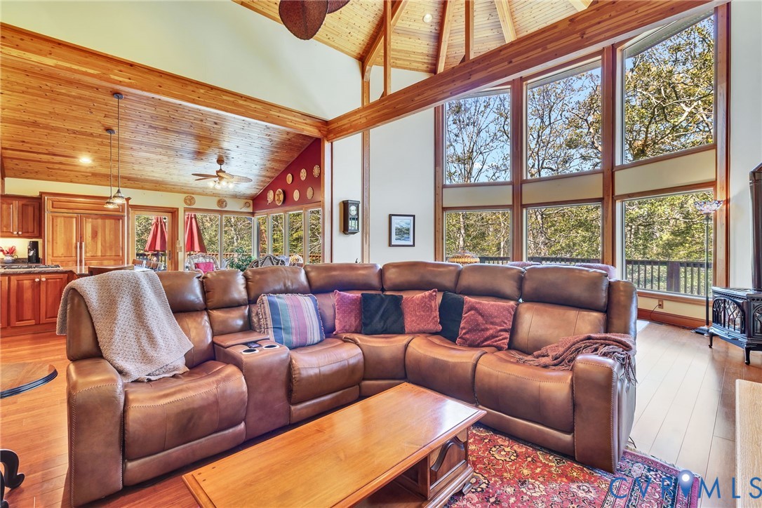 176 Baypointe Court Reedville, VA 22539 - Photo 18 of 59 a media room with furniture and a large window
