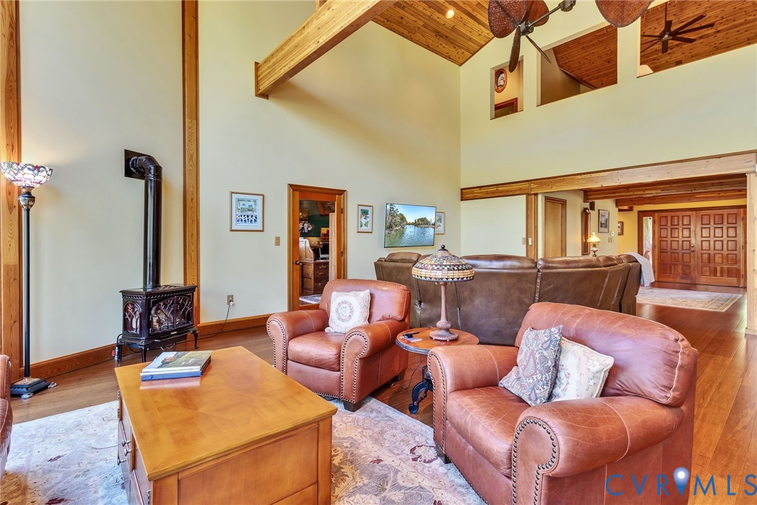 176 Baypointe Court Reedville, VA 22539 - Photo 22 of 59 a living room with furniture and a ceiling fan