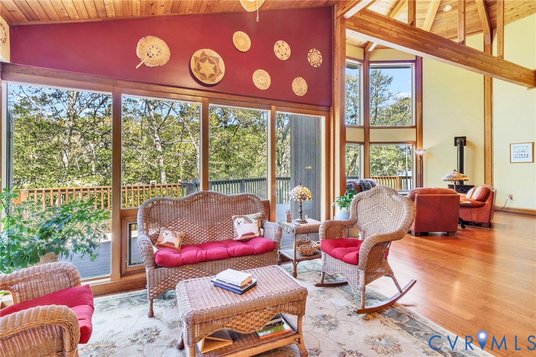 176 Baypointe Court Reedville, VA 22539 - Photo 24 of 59 a living room with furniture and a large window