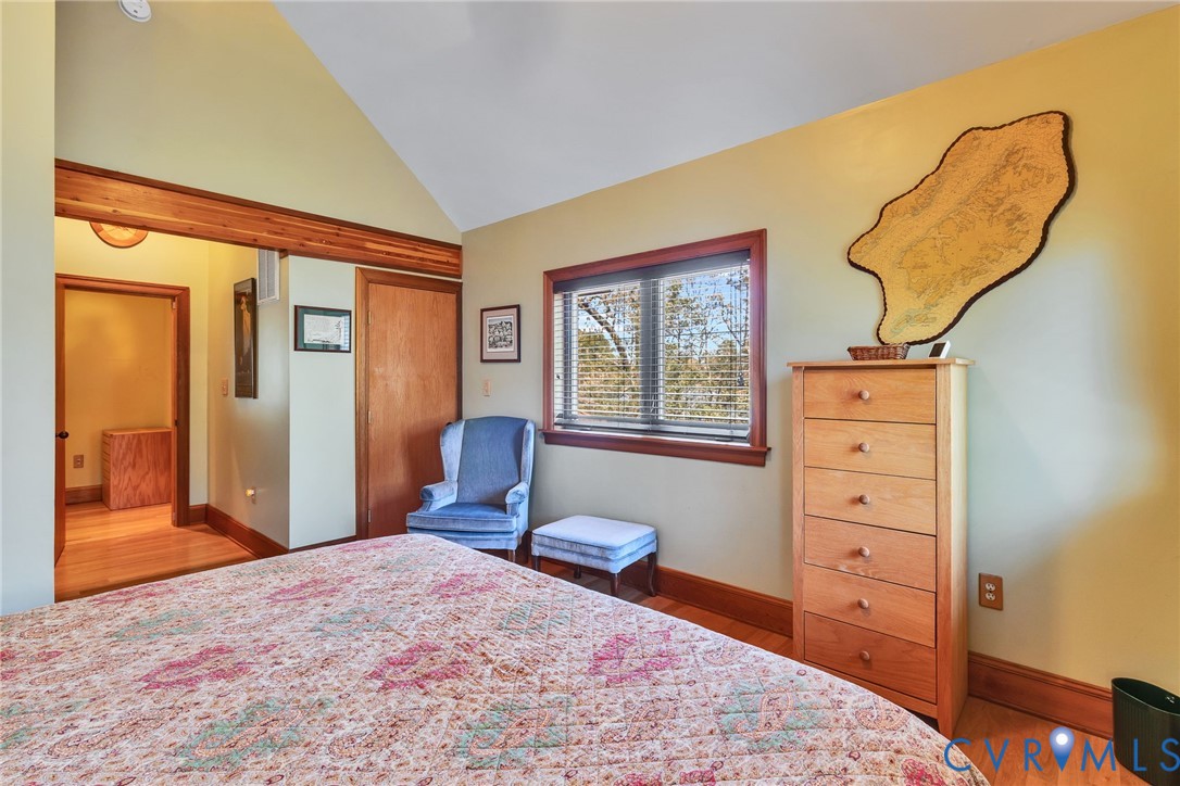 176 Baypointe Court Reedville, VA 22539 - Photo 45 of 59 a bedroom with a bed and a window