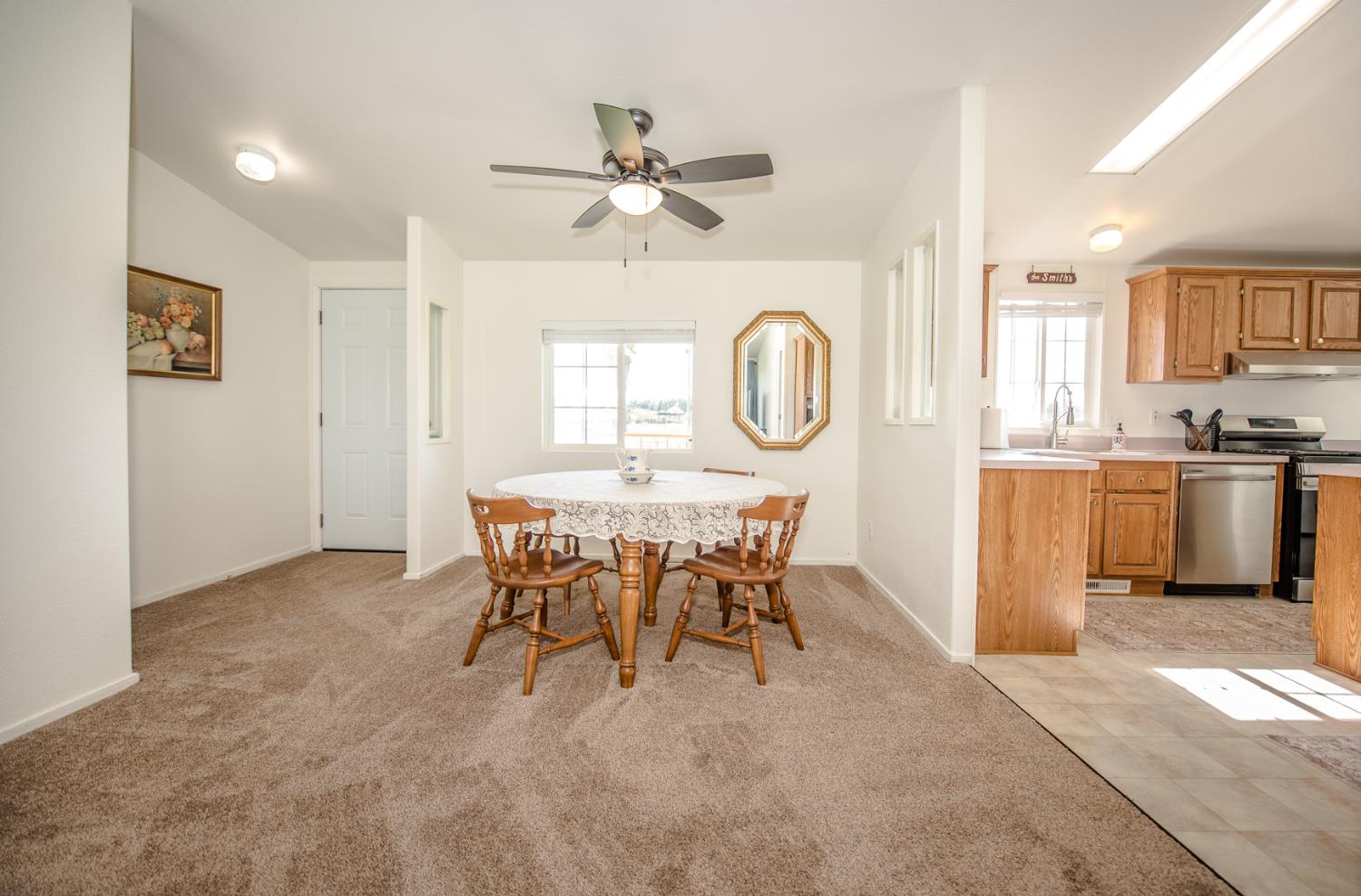 12076 County Road 84A Capay, CA 95607 - Photo 13 of 46 a view of a dining room with furniture and window