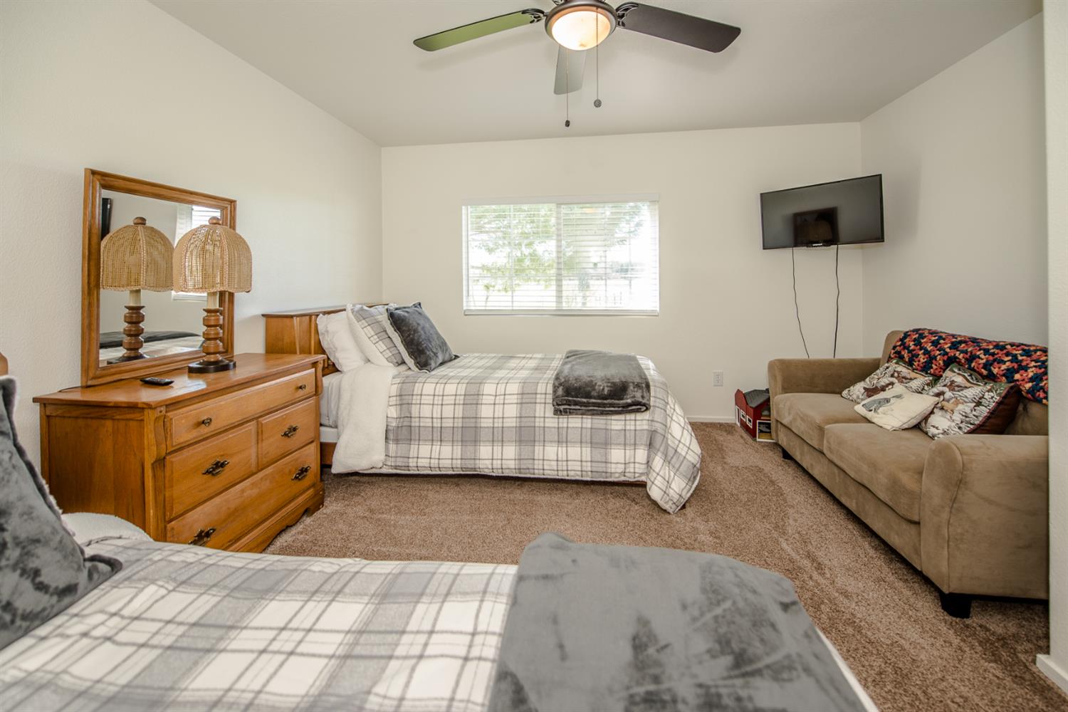 12076 County Road 84A Capay, CA 95607 - Photo 30 of 46 a bedroom with a bed and wooden floor