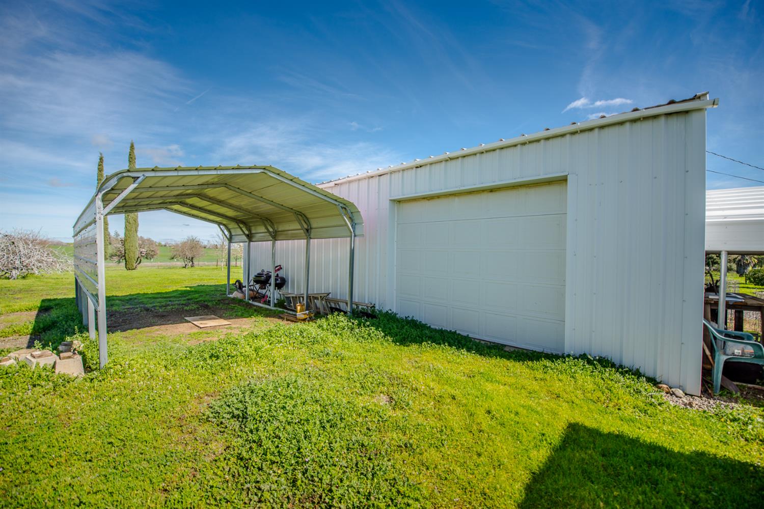 12076 County Road 84A Capay, CA 95607 - Photo 40 of 46 a backyard of a house with table and chairs