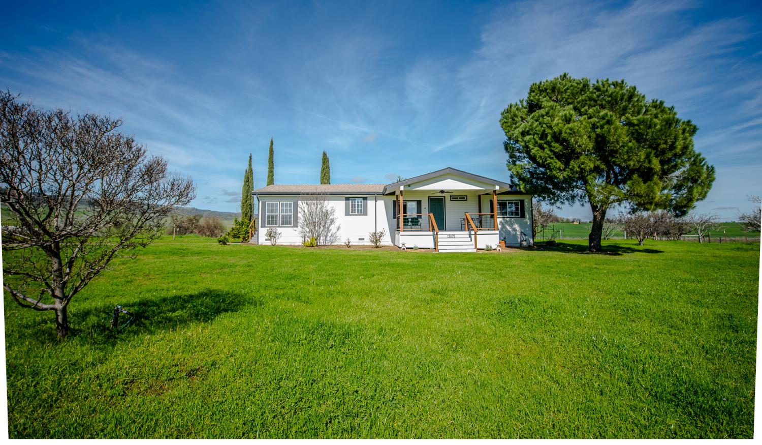 12076 County Road 84A Capay, CA 95607 - Photo 4 of 46 a view of a house with a big yard