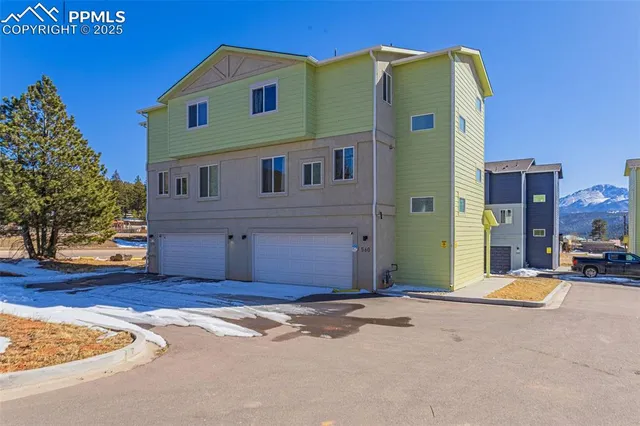 a view of a house with a swimming pool