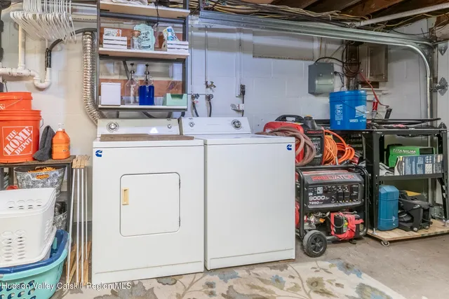 a view of a wooden house with a yard