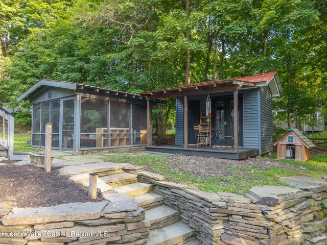 a front view of a house with yard