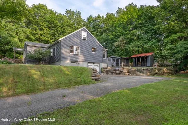 a view of a house with a garage
