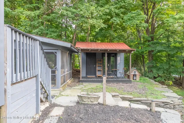 a patio with table and chairs