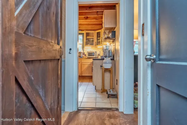 a view of a bathroom from a hallway