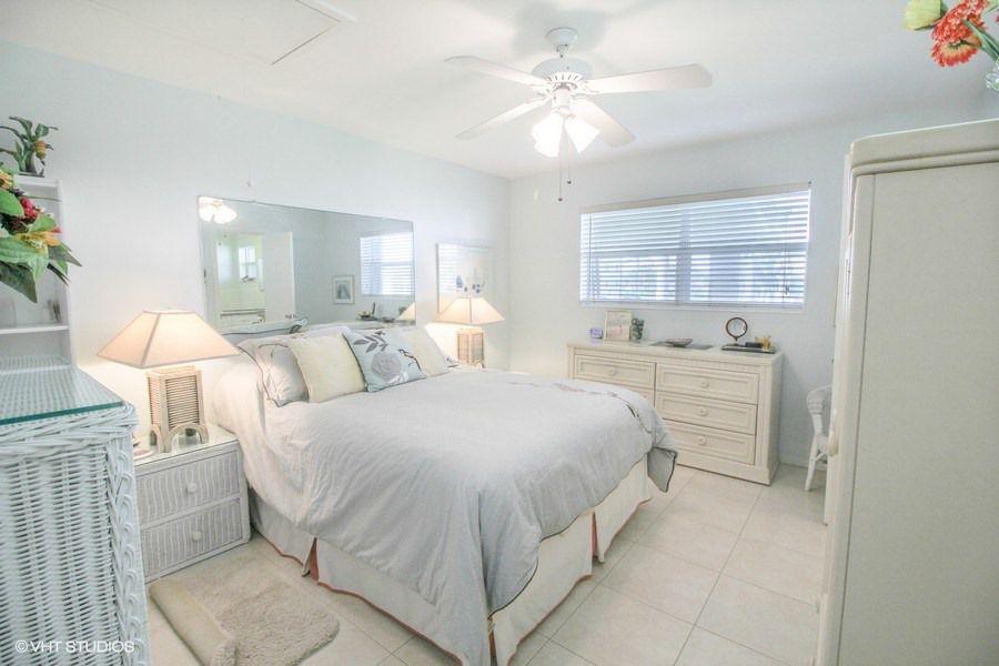 2561 South Ocean Boulevard, Unit 7 Boca Raton, FL 33432 - Photo 7 of 15 2561SOceanBlvd_Unit7_14_MasterBedroom_Lo