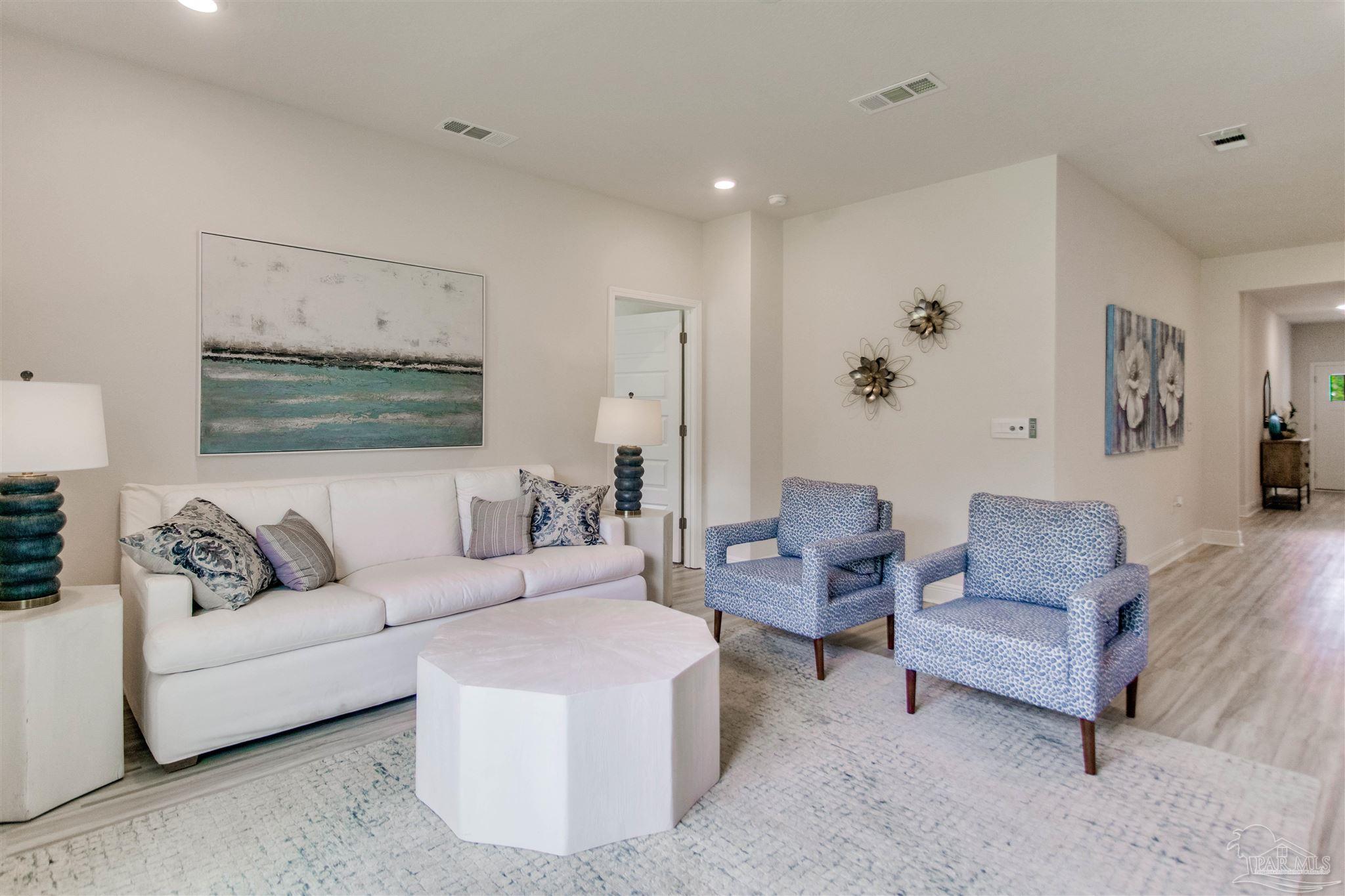 4753 Redhead Court Pace, FL 32571 - Photo 23 of 44 a living room with furniture and a couch