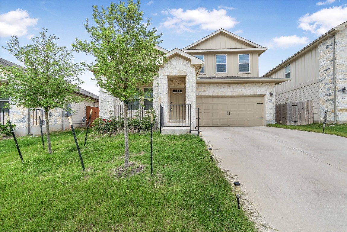 136 Sungrove Trail Georgetown, TX 78628 - Photo 1 of 1 a front view of house with yard and green space