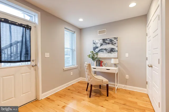 a workspace with furniture and window