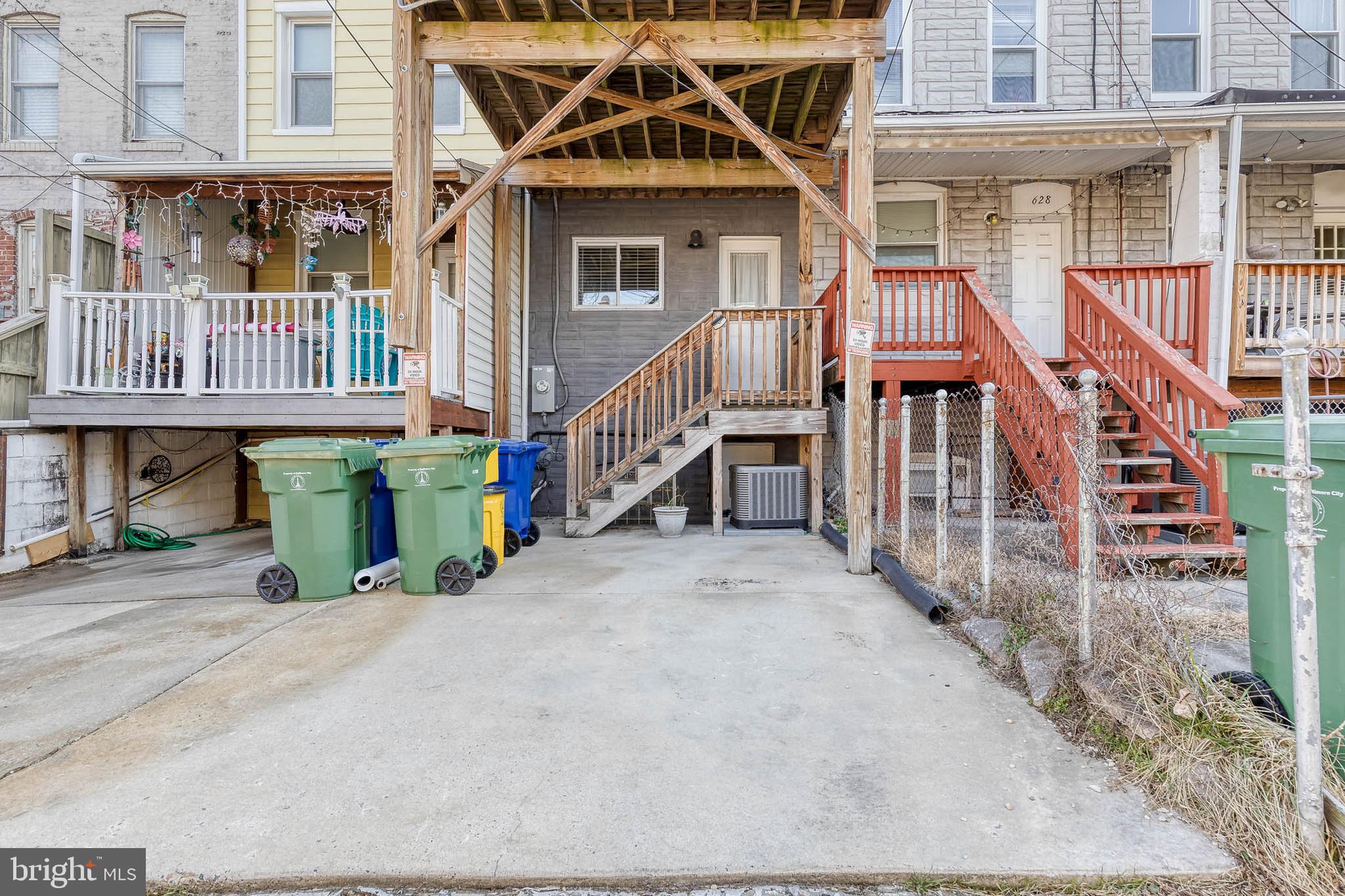 626 South Curley Street Baltimore, MD 21224 - Photo 23 of 23 an front view of a house with deck