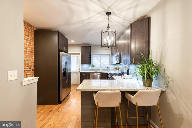 a view of a dining room with furniture