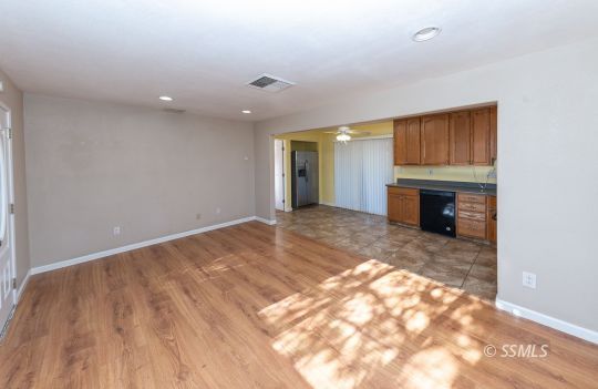 140 North Helena Street Ridgecrest, CA 93555 - Photo 4 of 30 a view of a livingroom with a fireplace