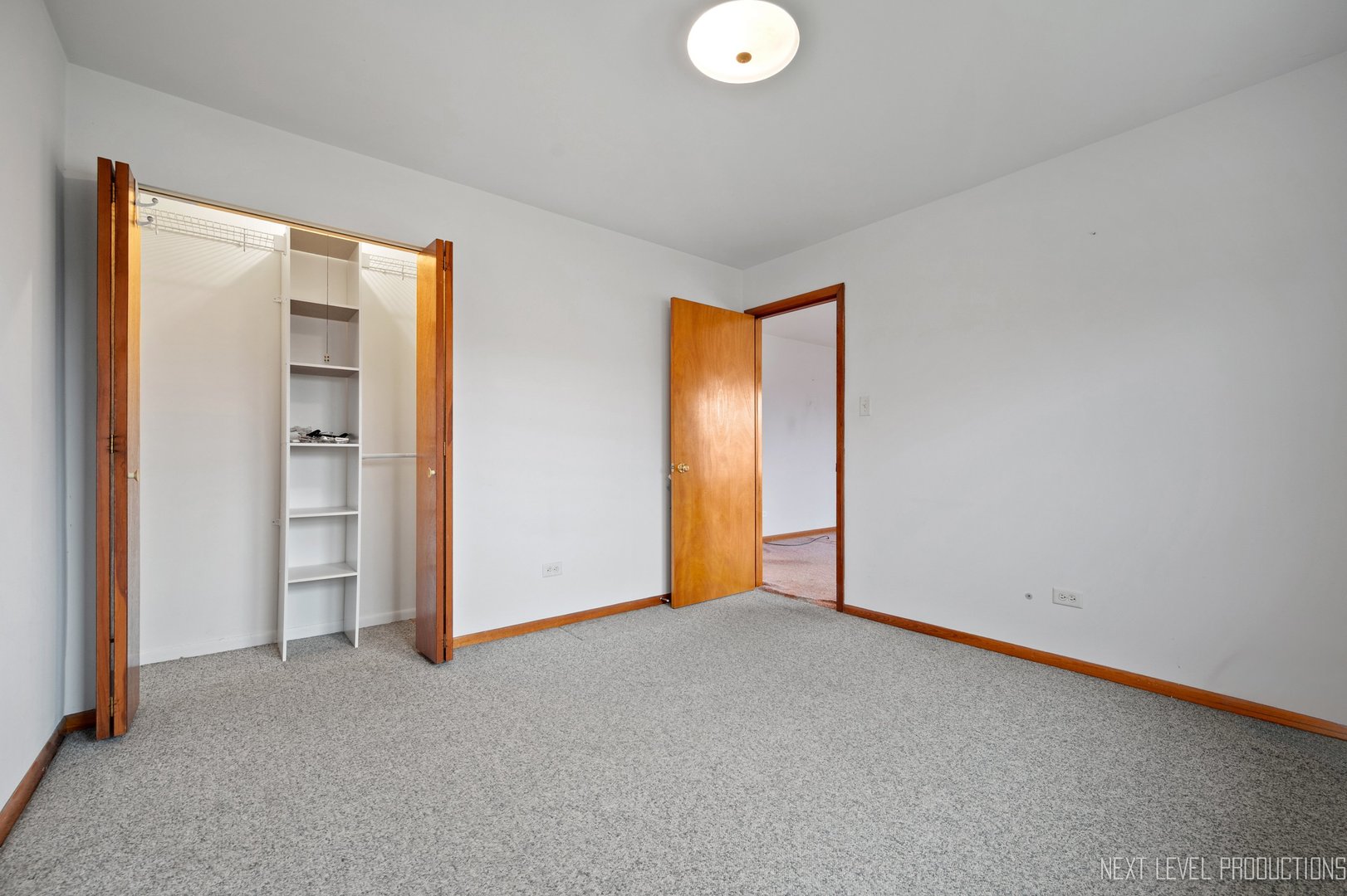 10336 Leslie Lane Chicago Ridge, IL 60415 - Photo 13 of 28 a view of an empty room and window
