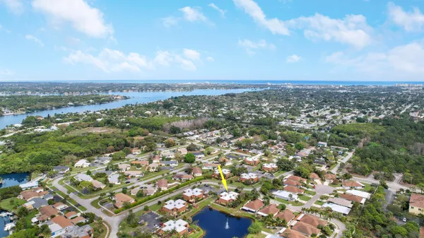 an aerial view of a city with lots of residential buildings