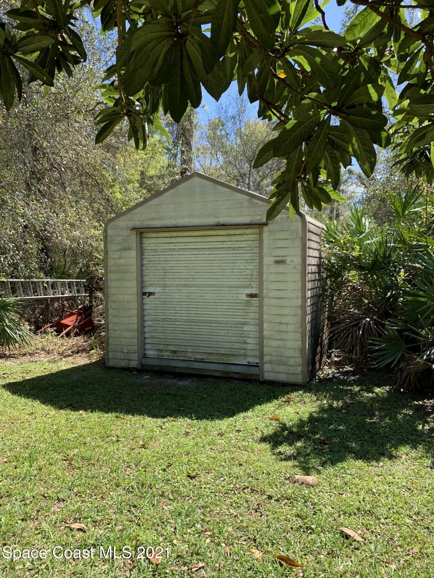 3485 Grant Line Road Mims, FL 32754 - Photo 40 of 40 a view of a garage