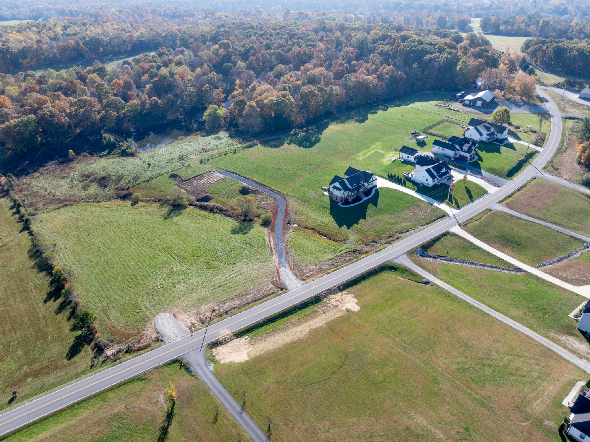 551 Buddy Road Burns, TN 37029 - Photo 16 of 29 a view of a swimming pool with a lot of trees in the background