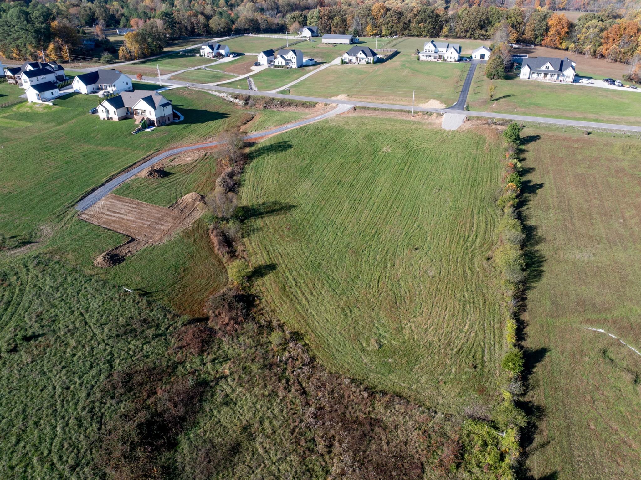 551 Buddy Road Burns, TN 37029 - Photo 24 of 29 an aerial view of a house with a yard basket ball court and outdoor seating