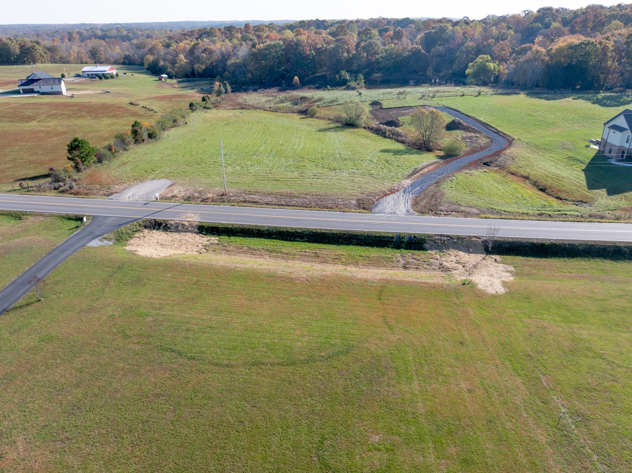 551 Buddy Road Burns, TN 37029 - Photo 4 of 29 a view of a lake with a yard