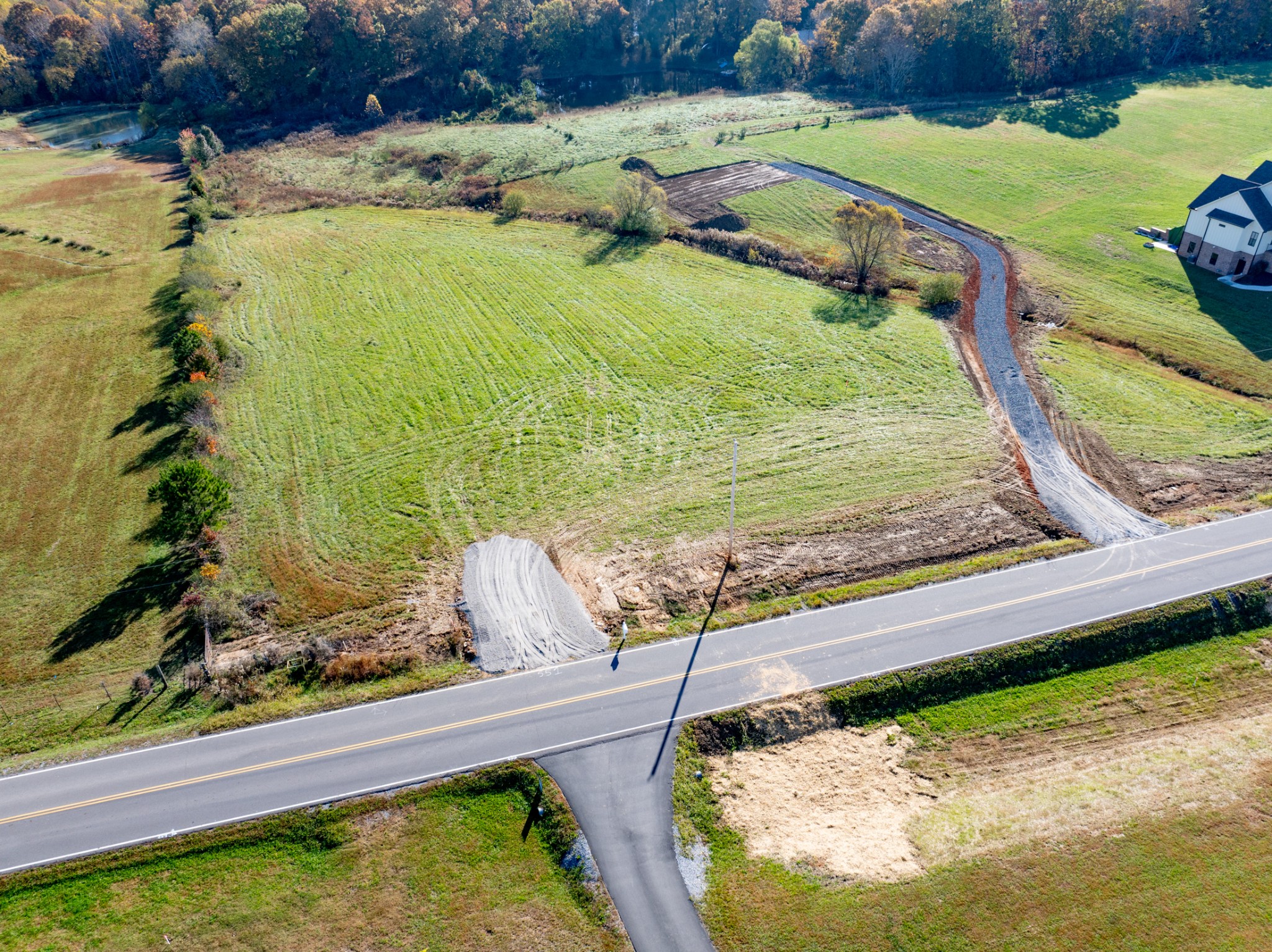 551 Buddy Road Burns, TN 37029 - Photo 7 of 29 a view of a garden with an outdoor space