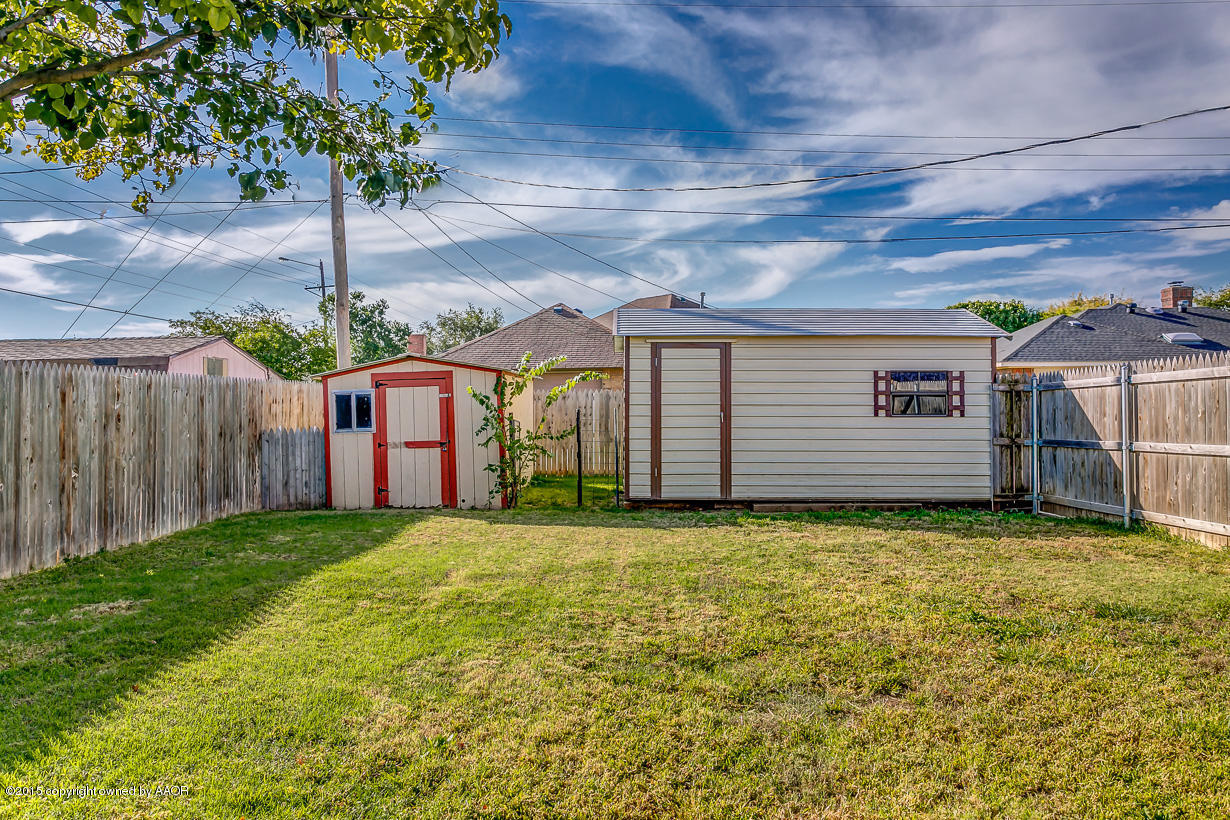 4203 Rondo Avenue Amarillo, TX 79110 - Photo 18 of 21 a view of a backyard with plants