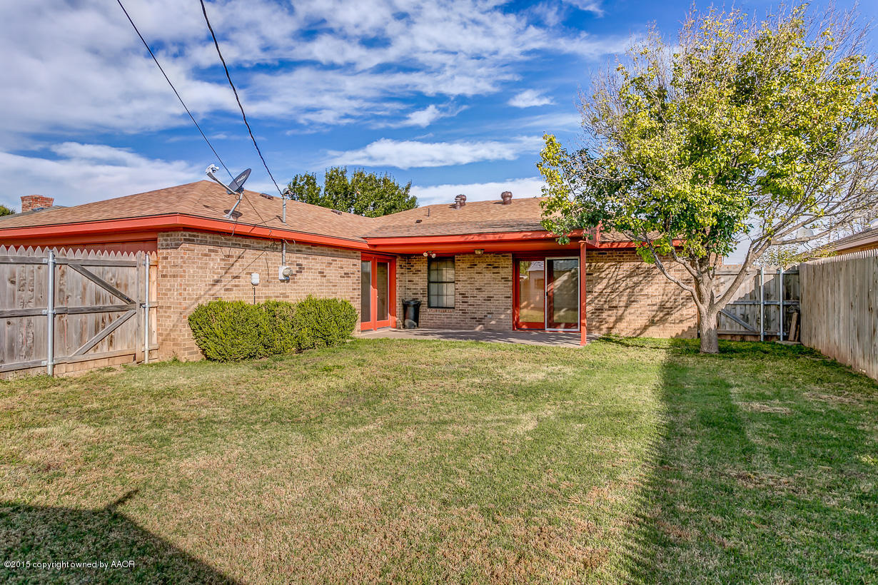 4203 Rondo Avenue Amarillo, TX 79110 - Photo 20 of 21 a view of a house with a yard
