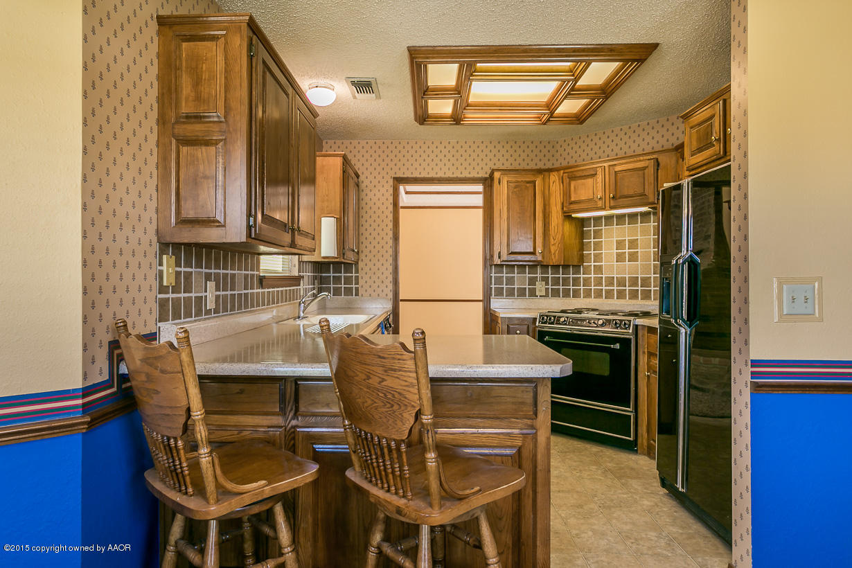 4203 Rondo Avenue Amarillo, TX 79110 - Photo 7 of 21 a view of a dining room with furniture
