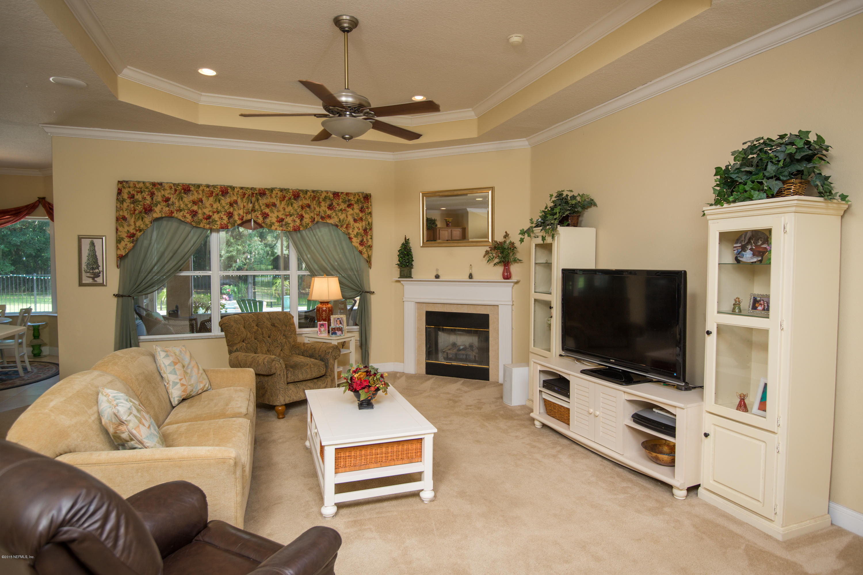 3509 Kings Road South St. Augustine, FL 32086 - Photo 7 of 29 Spacious Living Room with Tray Ceilings