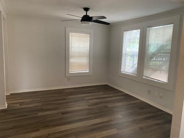 2014 Caddo Street, Unit 2012 Dallas, TX 75204 - Photo 2 of 2 an empty room with wooden floor and windows